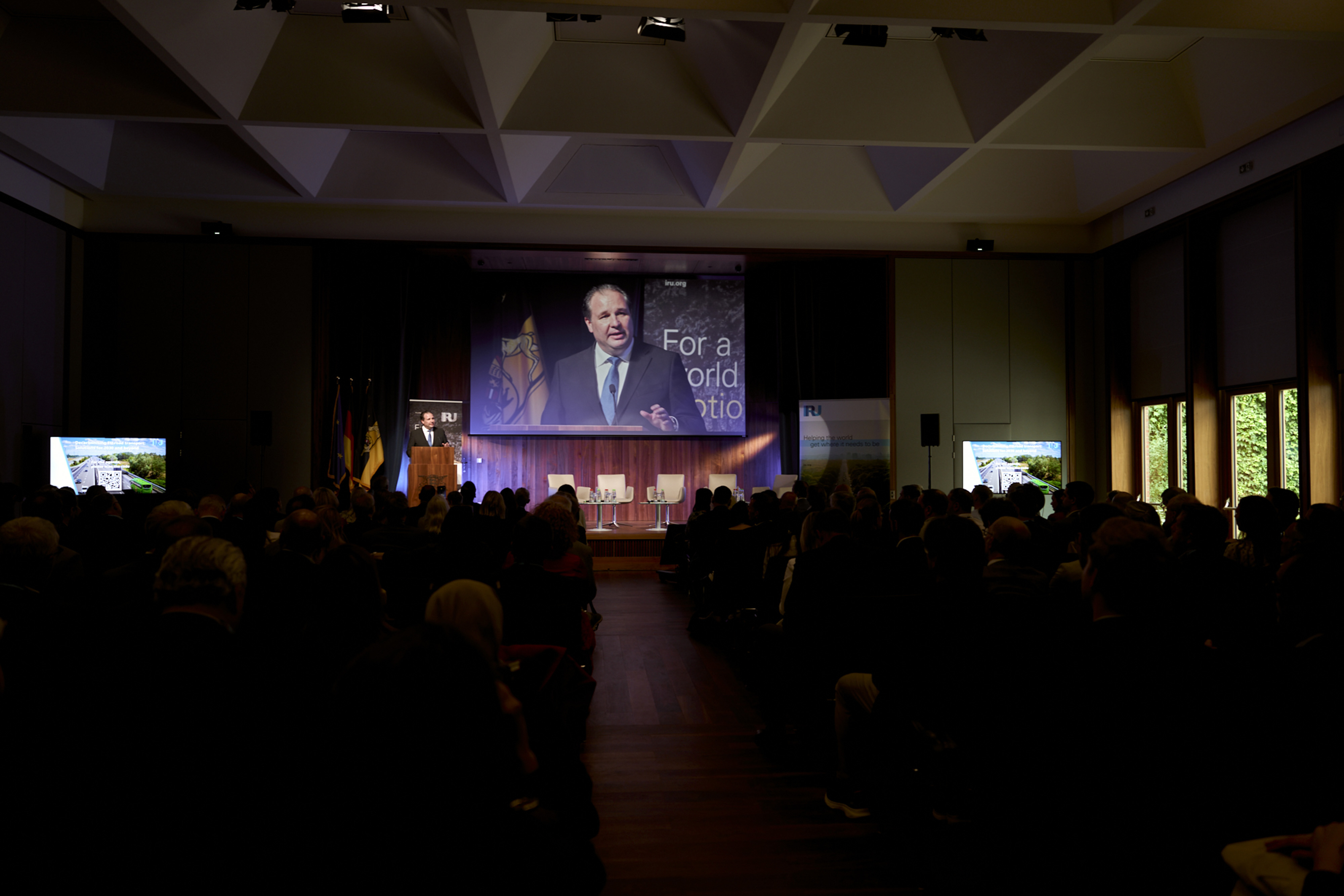 Put photos here in carousel sent via Webex     Driving the decarbonisation debate     Throughout 2025, IRU ensured that the transition to low- and zero-emission road transport remained grounded in operational reality.   A highlight was IRU&rsquo;s EU decarbonisation flagship event, held in Brussels with the participation of the Belgian Minister for Mobility, EU policymakers, industry leaders and operators. The event focused on realistic decarbonisation pathways, fleet diversity and the importance of enabling cond