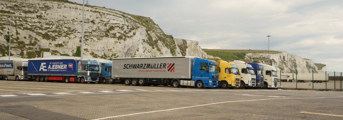 Lorry trucks waiting in a queue to board ferry at the port of Dover